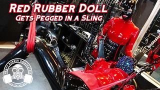 Red Rubber Doll Gets Pegged In Sling – Lady Bellatrix In Latex Catsuit With Strapon