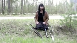 [edited] Black Skirt Woman With No Legs, Merely Pegleg & Crutches