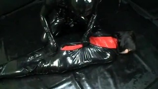 Asian Latex Catsuit Sack