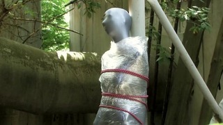 Bondaged And Cocooned Slave Girl In The Mystery Backyard – Full Encasement Kink In Zentai Body Bag