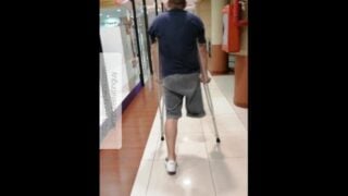 Amputee Guy Walking With Crutches